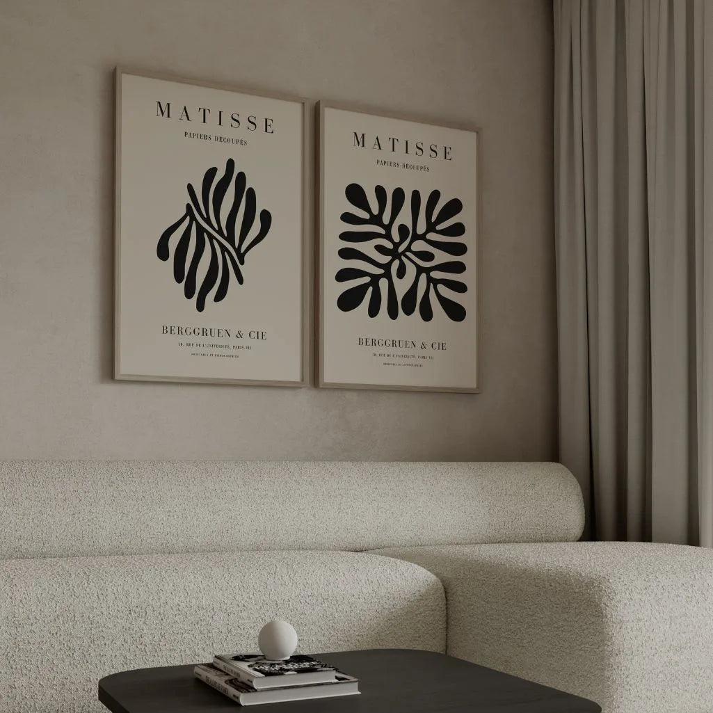 Set of 2 beige abstract posters styled in japandi bedroom with minimal decor