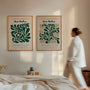 Set of 2 abstract green leaf posters arranged as gallery wall in bright modern interior