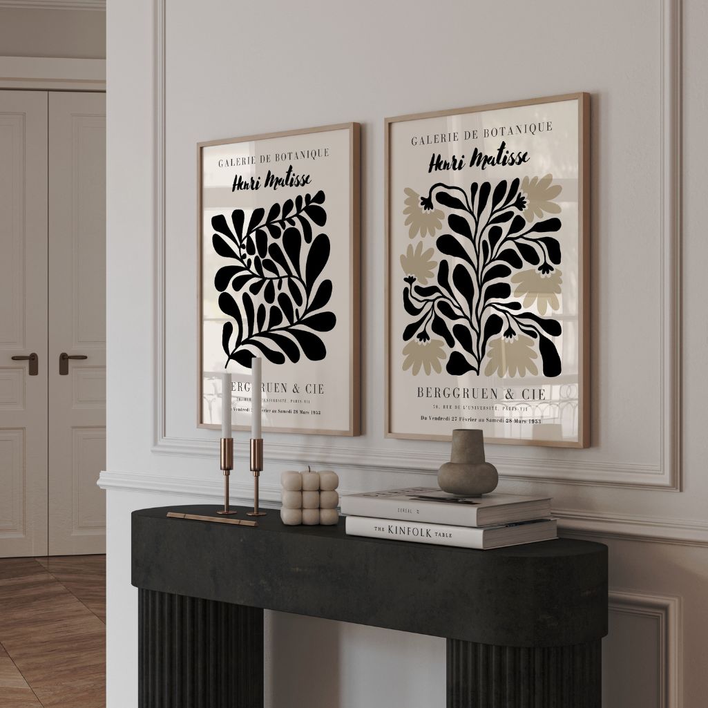 Close up of graphic botanical poster set showing black plant forms and clean lines