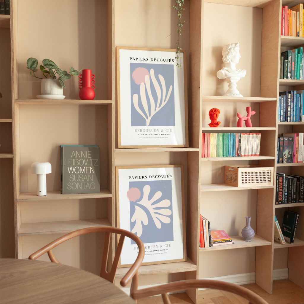 Close up of pastel botanical poster set showing beige pink and blue abstract shapes